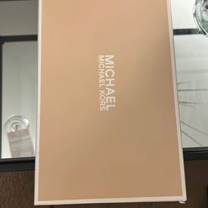 Gently used ladies leopard Michael Kors shoes